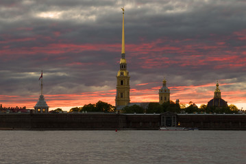 Peter and Paul fortress on the background of a gloomy sunset. Saint Petersburg, Russia