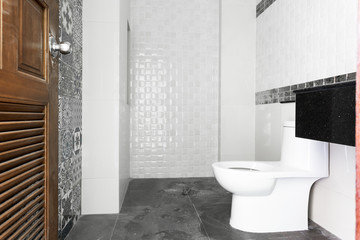 Obraz na płótnie Canvas Modern design home bathroom White sanitary ware in the bathroom. Under construction