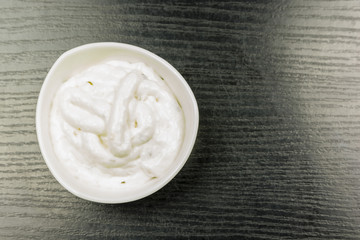 Garlic sauce in a bowl. View from above.