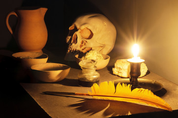 Masonic reflection chamber with alchemic symbols: the skull, the pen, the salt, the mercury, the...