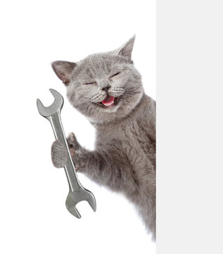 Funny Cat Worker With Wrench Behind White Banner. Isolated On White Background