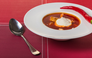 fresh red borsch with sour cream