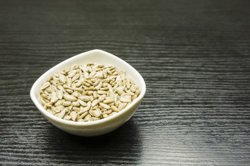 Sunflower seeds dehulled in a bowl.