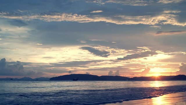 Amazing ocean landscape with sun setting over tropical beach, Thailand