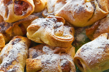 baked rolls with sweet powder and poppy seeds.plan major