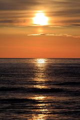 Obraz premium Colorful sunset over the Baltic Sea shore and beach in Rowy, Poland