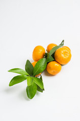 Mandarines on the rustic wooden background. Selective focus. Shallow depth of field.