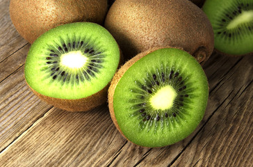 Kiwi fruits on wooden table