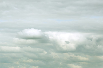 thick Puffy gray-white cloud over the island in a tropical country day.