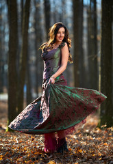 Woman in green dress dancing