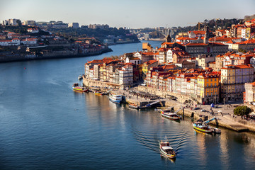 Obraz premium Beautiful cityscape, Porto, Portugal, old city. View of the city and the river. A popular destination for traveling in Europe