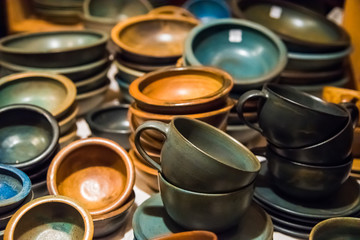 Handmade dishes made of clay. Pottery. Germany