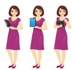 Woman in dress with tablet in different poses