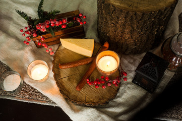  Delicious dinner in Ukrainian style sausage and cheese on hemp by candlelight looks very appetizing