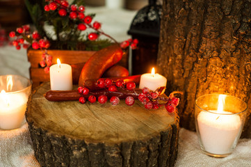  Delicious dinner in Ukrainian style sausage and cheese on hemp by candlelight looks very appetizing