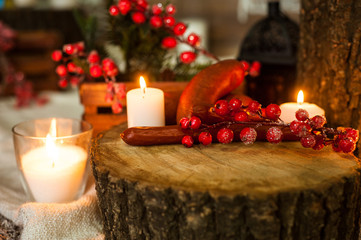  Delicious dinner in Ukrainian style sausage and cheese on hemp by candlelight looks very appetizing
