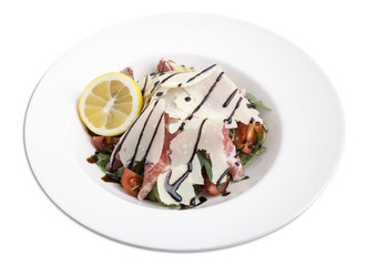 Arugula salad with prosciutto and parmesan.