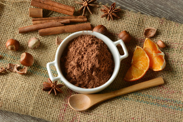 cocoa powder in the white bowl