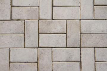 Gray tiled floor outdoors in shape rectangle, full frame
