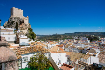 Fototapeta na wymiar Olvera is a white village in Cadiz province, Andalucia, Southern Spain - the Parroquia de Nuestra Senora de la Encarnacion and the Moorish castle