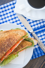 Toasted sandwiches with tomato and bacon