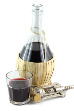Vino in bicchiere e fiasco