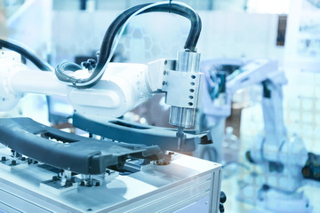 industrial machine and factory robot arm,Smart factory industry 4.0 concept.