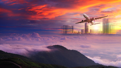 Big white airplane is flying over the clouds with colorful sky at sunset for Business trip with Commercial plane , Transportation, import-export and logistics, Travel concept