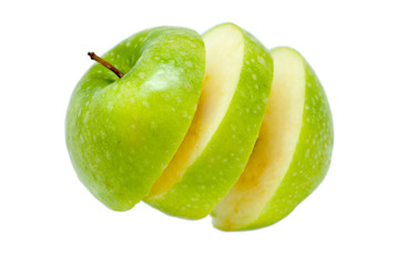 ripe delicious apple cut in slices isolated floating on white background