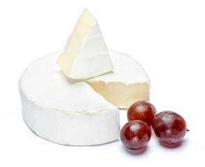 Round brie or camambert cheese on a white background
