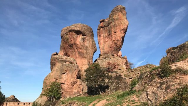 Blue sky behind sandstone and conglomerate formations in Western Bulgaria  footage - Natural landmark near town of Belogradchik