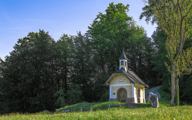 Fototapeta na wymiar Small chapel on the hill in Berchtesgaden Bavarian national park