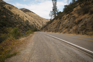 road near merced river on warm autumn day