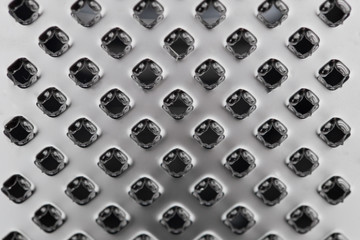 surface of a metal float as a background. Close-up.