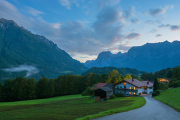 Alpine valley with country living house, late evening, Germany
