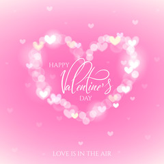 Happy Valentines Day celebration greeting card decorated with bokeh heart shape.