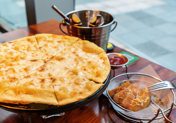 Delicious pizza with chili mushrooms and sausages