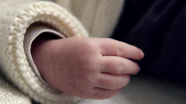 Close Up Of Newborn Baby's Hand Moving
