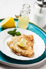 English-style pancakes with lemon and sugar