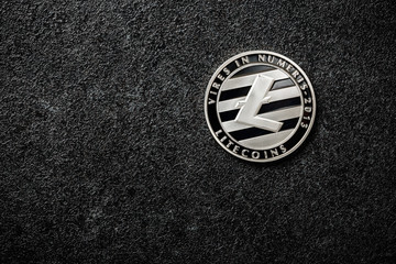 Litecoin coin on black background