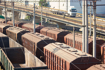 Freight trains - Cargo transportation. Static goods trains in depot, close up.