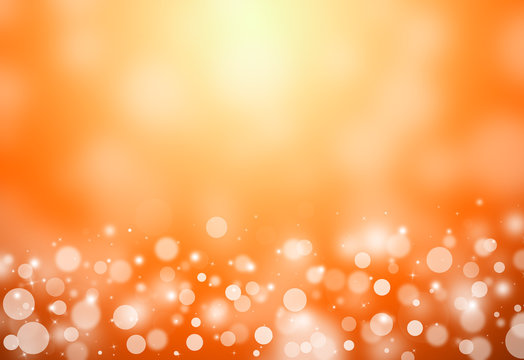 Gold glitter sparkles rays lights bokeh festive elegant abstract background.