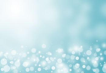Obraz premium Blue glitter sparkles rays lights bokeh festive elegant abstract background.