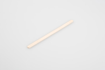 wooden stirrer for coffee in white background