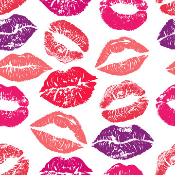 Seamless pattern with lipstick kisses. Colorful lips of red purple and pink shades isolated on a white background.fabric print, wrapping or romantic greeting card design. Print of lipstick kiss vector