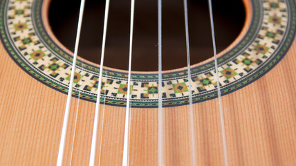 Obraz premium Classical guitar: strings and rosette.