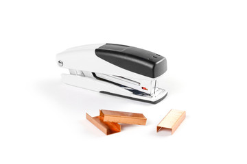 Stapler for paper on white background. Closeup