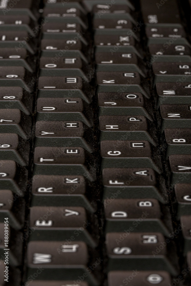 Fototapete black keyboard closeup. keyboard pattern. horizontal pattern. vertical pattern.