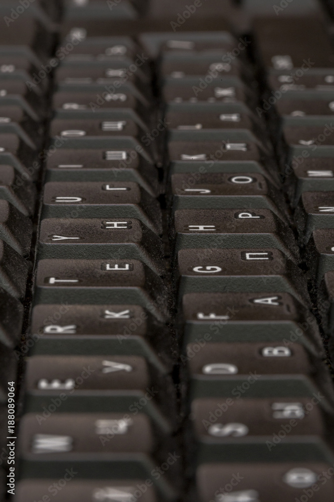Fototapete black keyboard closeup. keyboard pattern. horizontal pattern. vertical pattern.
