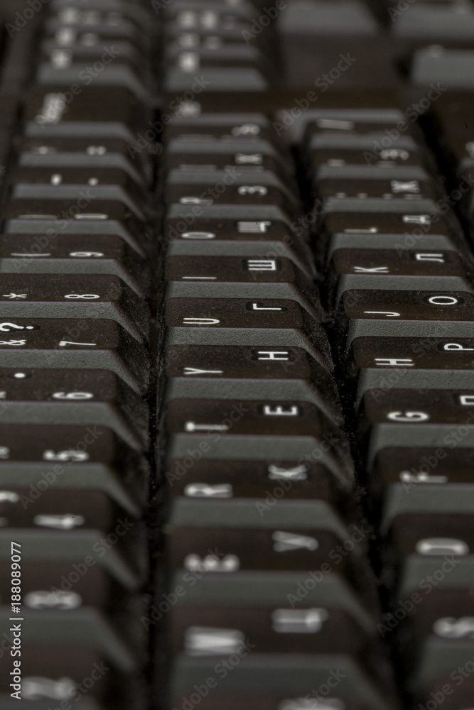 Fototapete black keyboard closeup. keyboard pattern. horizontal pattern. vertical pattern.